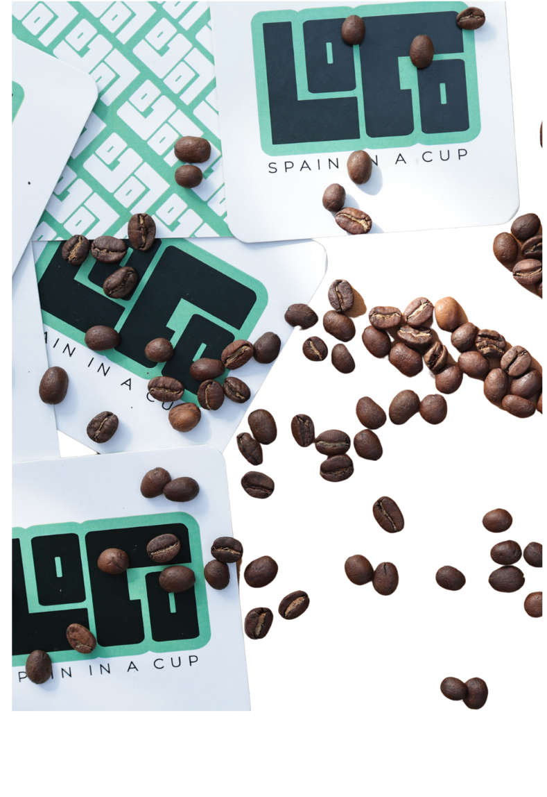 LOCO cards with freshly roasted Spanish coffee beans spilling across them